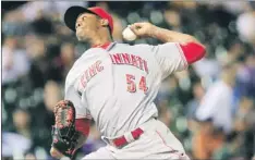  ?? — Photo by The Associated Press ?? Hard-throwing Cincinnati reliever Aroldis Chapman has made 14 appearance­s in July, picking up 12 saves, while allowing no runs and just six hits in 13.1 innings. Chapman has struck out 30 batters and walked just two during the month.