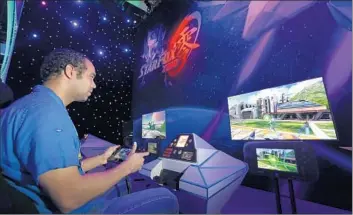  ?? Allen J. Schaben
Los Angeles Times ?? RAFAEL BROWN plays Nintendo’s new “Star Fox Zero” at E3. Players have two viewpoints in the game.