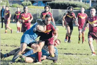  ?? Photo: ANDREA
O’NEIL ?? Hungry: Porirua Vikings fullback
Isiraeli Baletivuki takes on the University line.