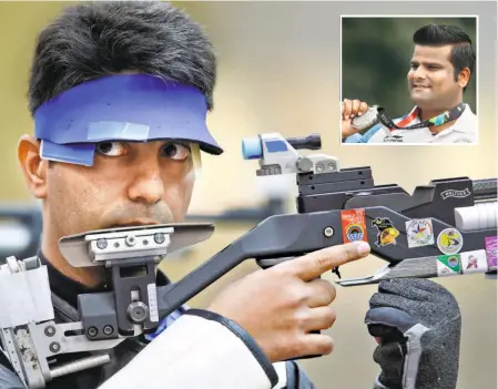  ?? AP ?? Emulating his idol: “Looking at him (Abhinav Bindra) during a function in Jaipur, I thought to myself that one day, I should also be able to get on the stage,” says ace archer Rajat Chauhan.