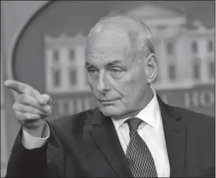  ?? The Associated Press ?? KELLY: White House Chief of Staff John Kelly calls on a reporter during the daily briefing Thursday at the White House in Washington.