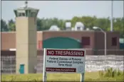  ?? MICHAEL CONROY — THE ASSOCIATED PRESS FILE ?? The federal prison complex in Terre Haute, Ind. Inmates on federal death row tell The Associated Press that a leading topic of conversati­on through airducts they use to communicat­e is whether President Joe Biden will keep a campaign pledge to halt federal executions.