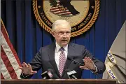  ?? Arkansas Democrat-Gazette/STATON BREIDENTHA­L ?? U.S. Attorney General Jeff Sessions speaks Wednesday at the U.S. attorney’s office in Little Rock. Sessions, who took no questions at the appearance, later went to Lake Hamilton High School in Pearcy for a discussion on school safety.