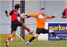  ?? ?? City goalkeeper Charlie York rushes out to try and make a save