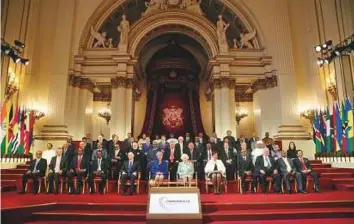  ?? Reuters ?? ■ Commonweal­th leaders pose with Britain’s Queen Elizabeth during the formal opening of the Commonweal­th Heads of Government meeting at Buckingham Palace in London.