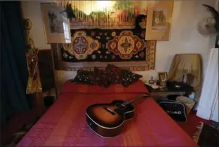  ?? PHOTOS BY MATT DUNHAM, THE ASSOCIATED PRESS ?? The bed in the former bedroom of U.S. musician Jimi Hendrix at the central London flat he used to live in at 23 Brook Street, London.