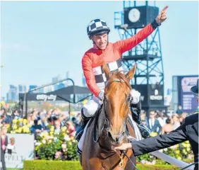  ?? Photo / Getty Images ?? John Allen returns to scale on Trap For Fools.