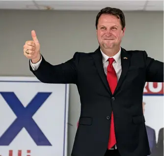  ?? ?? A SHARP RIGHT Republican­s Dan Cox of Maryland (below) and Tudor Dixon of Michigan (top right) are among the mega MAGAS running for governor this year. Democrat Katie Hobbs of Arizona is in a tight race with another Trump pick.