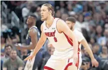  ?? DAVID ZALUBOWSKI/AP ?? Coach Erik Spoelstra said newcomer Kelly Olynyk is looking “very comfortabl­e” in the Heat’s offensive and defensive systems.