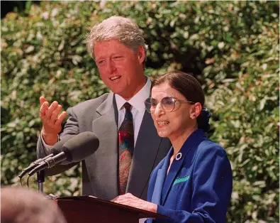  ?? ASSOCIATED PRESS ?? President Bill Clinton poses with his nominee for the Supreme Court Ruth Bader Ginsburg during a news conference June 14, 1993, in Washington. Throughout her years on the bench, she made decisions that favored not only gender equality, but the rights of everyone.