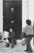  ?? GETTY IMAGES ?? A woman has her picture taken outside the home of the late Margaret Thatcher on Sunday.