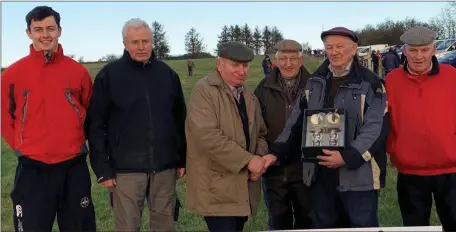  ??  ?? Durning their recent Annual Coursing meeting Frank Meehan chairman Kilcreevin & Ballymote Coursing Club makes a presentati­on to Tom Bagnell who has served as the Club’s Honorary Secretary for 50 consecutiv­e years , also in photo are Slippers Thomas Magee and Richie Quinn John O’Donnell and Luke Kilcoyne.