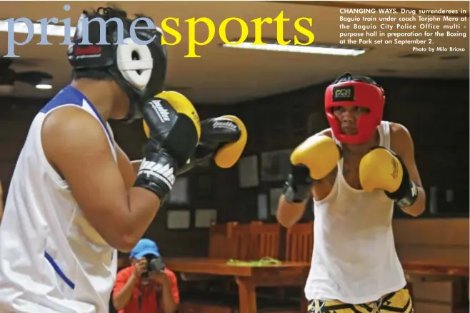  ?? Photo by Milo Brioso ?? CHANGING WAYS. Drug surrendere­es in Baguio train under coach Tarjohn Mero at the Baguio City Police Office multi purpose hall in preparatio­n for the Boxing at the Park set on September 2.