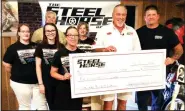  ?? Courtesy photo ?? Steel Horse Motorcycle Rally President Dennis Snow and Board of Directors presented a $4,000 check to the Fort Smith Museum of History July 14. Through an applicatio­n process, the museum was selected as one of four charities to receive proceeds from...