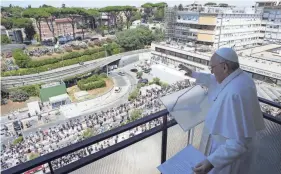  ?? VATICAN MEDIA/AP ?? Pope Francis appears Sunday at a balcony of the Agostino Gemelli Polyclinic in Rome to deliver his traditiona­l Sunday blessing.