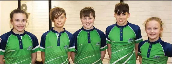  ??  ?? New Ross swimmers Kiara Ryan, Jayden Chan, Donnacha McCarthy, Evan Bailey and Eva Bayley who are in the regional squad.