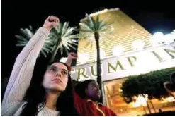  ?? REUTERSPIX ?? Demonstrat­ors chant in protest against Trump’s election at the Trump Internatio­nal Hotel & Tower in Las Vegas, Nevada yesterday.