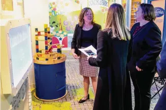  ?? Nick Sambides/Hearst Connecticu­t Media ?? Make-A-Wish Connecticu­t CEO and President Pam Keough, left, talks to Lt. Gov. Susan Bysiewicz, with back to camera, during a tour of the foundation’s headquarte­rs in Trumbull on Monday,.