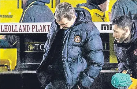  ??  ?? Dundee United boss Csaba Laszlo despondent at full-time after their 2-1 defeat to Livingston.