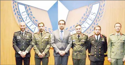  ?? KUNA photo ?? Ambassador Nasser Al-Qahtani with the head of the military office, Brigadier General Khaled Al-Otaibi, and the graduating officers.