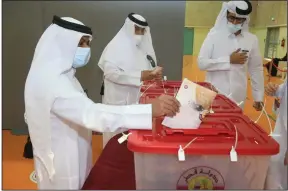  ?? (AP/Hussein Sayed) ?? Qataris vote in legislativ­e elections Saturday in Doha, Qatar.