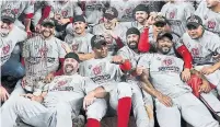  ?? DAVID J. PHILLIP THE ASSOCIATED PRESS FILE PHOTO ?? The Nationals won the 2019 World Series as a willd-card team. A new plan could see four more wild-card spots.