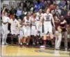  ?? PETE BANNAN — DIGITAL FIRST MEDIA ?? The Lower Merion bench reacts to it’s victory over Conestoga Friday.