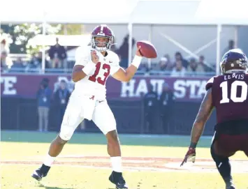  ?? ALABAMA PHOTO/KENT GIDLEY ?? Alabama quarterbac­k Tua Tagovailoa prepares to pass last November at Mississipp­i State, which turned out to be his final game with the Crimson Tide.