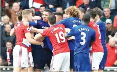  ??  ?? Players from both sides clash towards the end of the English Premier League football match between Middlesbro­ugh and Manchester United at Riverside Stadium in Middlesbro­ugh, north east England. - AFP photo