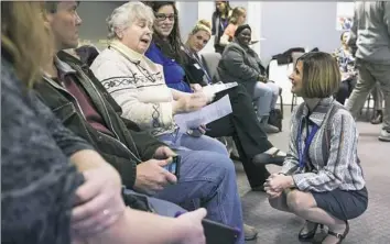  ?? Haley Nelson/Post-Gazette ?? Tina Chekan, right, superinten­dent of Propel schools, greets Marian Sefcik before a March 2 community forum at Word and Worship Church in Braddock Hills. Propel’s collection of lease reimbursem­ents has drawn criticism from state Auditor General Eugene...