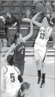  ?? MARK HUMPHREY ENTERPRISE-LEADER ?? Swan song. Lincoln senior Nikki Thordsen elevates to get off a jump shot in the lane against Gentry. Mistakes down the stretch cost the Lady Wolves, who were eliminated from the district tournament by the Lady Pioneers, 51-43, on Feb. 13 at Gentry.