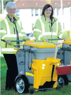  ??  ?? John Miller Scottish Socialist Party Clean sweep Renfrewshi­re councillor­s Cathy McEwan and Natalie Don at a promotion event for the campaign