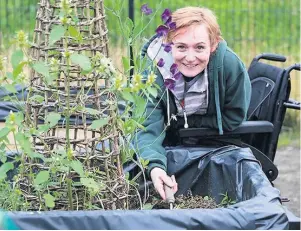  ??  ?? A huge help The raised beds make gardening so much easier for Amanda