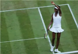  ?? REUTERS ?? HARD FOUGHT: Venus Williams celebrates after winning her second-round match against China’s Qiang Wang.