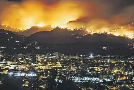  ?? Marcus Yam Los Angeles Times ?? SMOKE FROM the Maria fire billows over Santa Paula in October. Last month, PG&E cut power to millions as a precaution against fires.