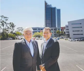  ??  ?? Colliers Internatio­nal’s Geoff Lamb and Darrell Irwin at the Riverwalk site.