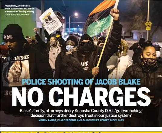  ?? ASHLEE REZIN GARCIA/SUN-TIMES ?? Justin Blake, Jacob Blake’s uncle, leads dozens on a march in Kenosha on Tuesday evening.