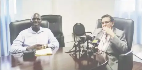  ??  ?? Deputy Chairman of the Local Government Commission, Andrew Garnett (left) and former Chancellor Justice Cecil Kennard addressing reporters at the LGC’s Eping Avenue office yesterday.