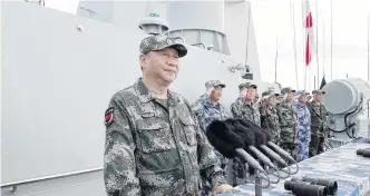  ?? PHOTO: XINHUA VIA REUTERS ?? Show of force . . . Chinese President Xi Jinping delivers a speech as he reviews a military display of the Chinese People’s Liberation Army Navy in the South China Sea on Thursday.