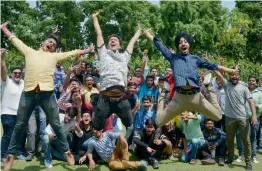  ?? — PTI ?? Students celebrate their success in Meerut after CBSE Class 10 results were announced on Saturday.