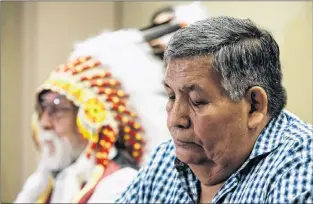  ?? CP PHOTO ?? Former Chief Steve Courtoreil­le with Chief Archie Waquan respond to the Supreme Court of Canada’s decision on Courtoreil­le v. Canada in Edmonton on Thursday.