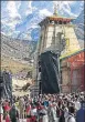  ?? HT PHOTO ?? ▪ (Above) Devotees during opening of the portals of Kedarnath shrine on Sunday. (Right) A seer during the ceremony.
