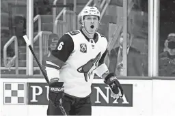  ?? AP ?? Arizona Coyotes' Jakob Chychrun celebrates after scoring during the first period of an NHL hockey game against the St. Louis Blues Saturday in St. Louis.