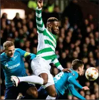  ??  ?? Moussa Dembele battles with Zenit St Petersburg players