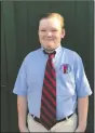  ?? (Courtesy Photo/Courtney Pulitzer) ?? Simon Joubeaud Pulitzer, 10, of Tucson, Ariz., returned to his private school Aug. 3, in his blue button-down uniform shirt and tie in place. He was happy to see his friends again and have face-to-face access to his teachers.