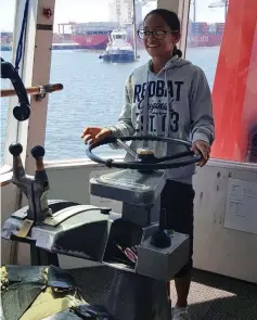  ?? PICTURE: SLT (SCCC) ?? FOCUSED: Gracia Pillay at the wheel of a Cape Town tug Pinotage.