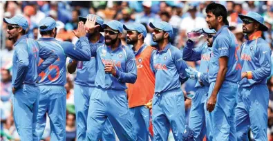  ?? – AP/PTI ?? DOMINANT DISPLAY: Indian players celebrate during their Champions Trophy match against South Africa at The Oval on Sunday.