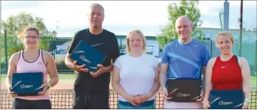  ?? ?? ABOVE: Mitchelsto­wn Tennis Club members Elodie Ruelle and Michael Waldron, winners of the mixed doubles grade 1 in Larkspur Park Cashel open last Saturday.