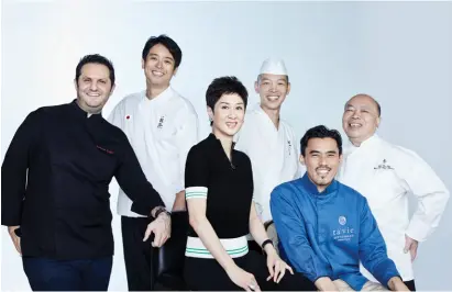  ??  ?? To curate the evening’s five-course menu, Michelle recruited some of the city’s top chefs from a variety of cuisines. From left: Guillaume Galliot, Hidemichi Seki, Kenichi Fujimoto, Hideaki Sato and Chan Yan-tak