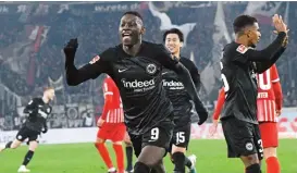  ?? ?? Frankfurt's Randal Kolo Muani (C) continued his top form and now has seven goals and 10 assists in the league